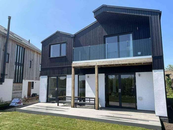nHouse dark cladding rear